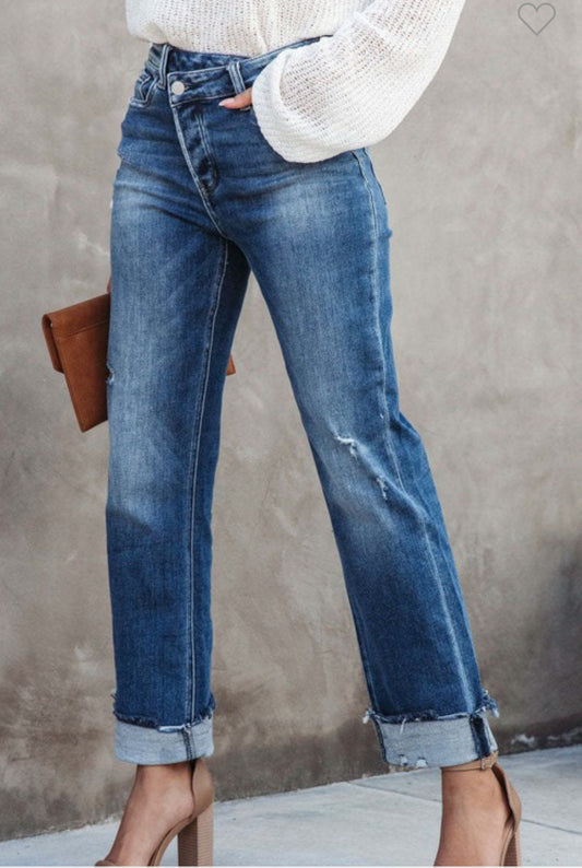 ASYMMETRICAL CRISS CROSS BUTTON JEANS